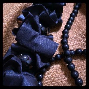 RUFFLED AND BEADED BLACK NECKLACE